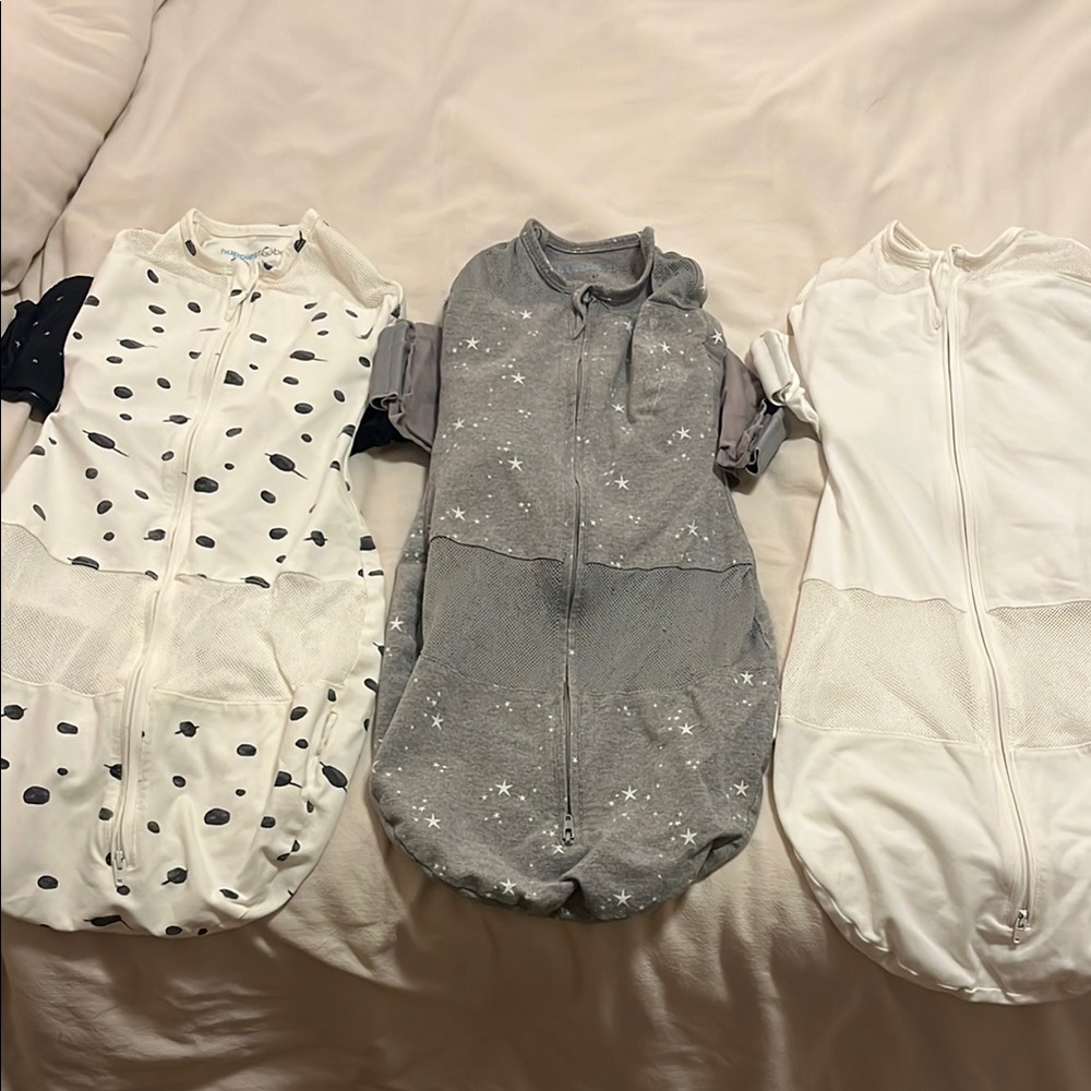 Three Snoo swaddles